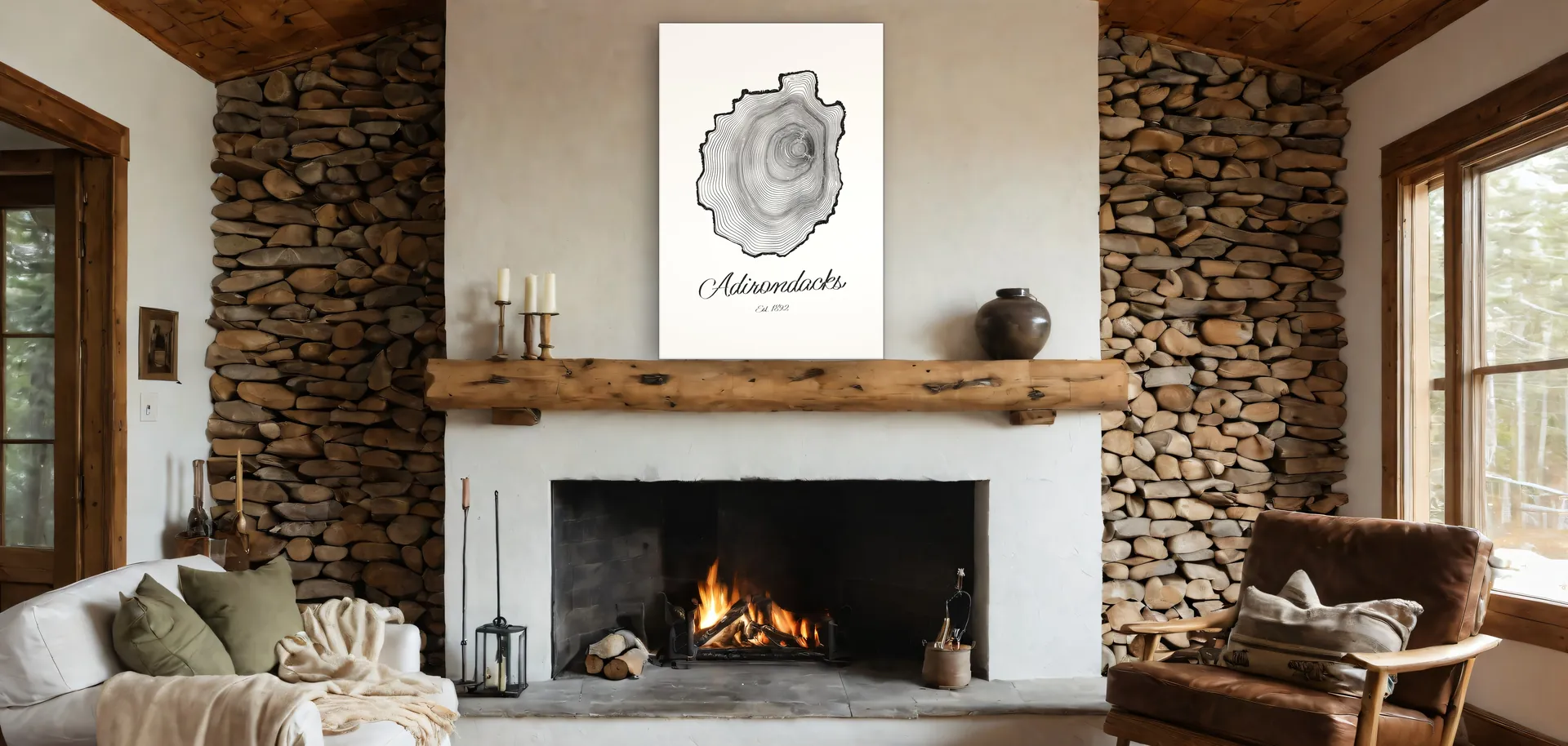 The 24 by 36 inch Ring & Ridge canvas leaning on a log mantel above a stone fireplace in an Adirondack living room.