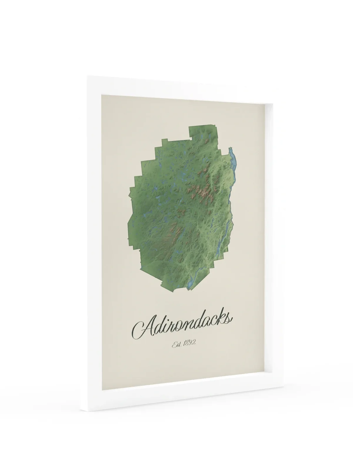 Adirondack Park Map as a 12 by 16 inch framed print in a white frame: a painted-style map of the Adirondack Park with its lakes, rivers and High Peaks in green on cream paper, with Adirondacks, Est. 1892 in dark green script below.