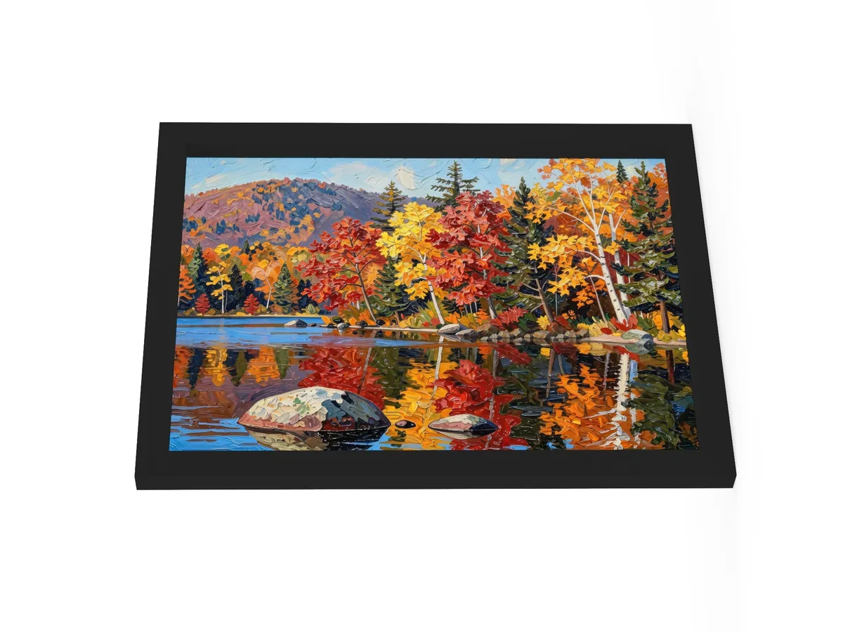 Autumn Shoreline as a 12 by 16 inch framed print in a black frame: red, orange and yellow fall trees and white birches along a calm lake, mirrored in the water, in bold oil-painting brushstrokes.