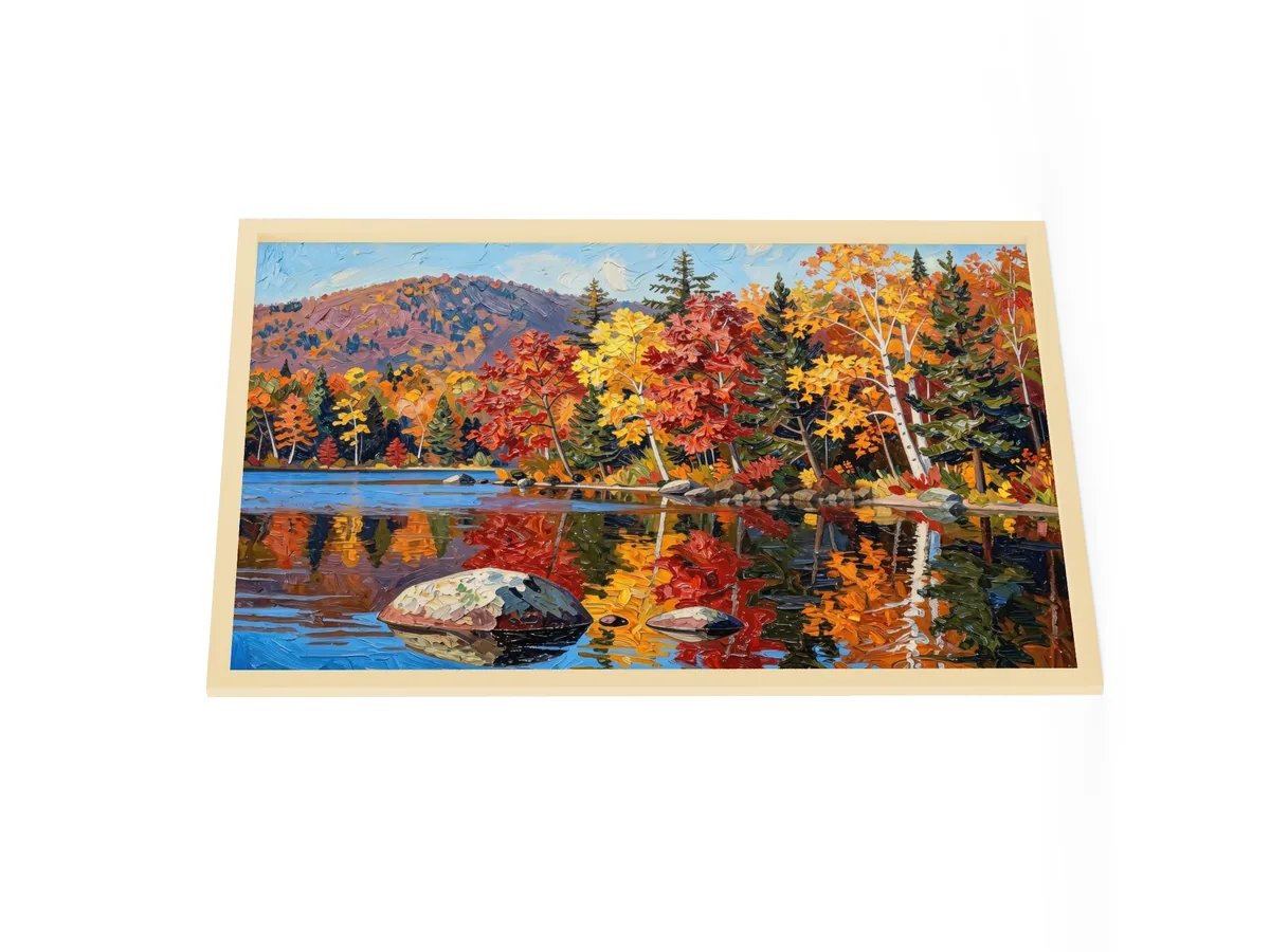 Autumn Shoreline as a 24 by 36 inch framed print in a natural wood frame: red, orange and yellow fall trees and white birches along a calm lake, mirrored in the water, in bold oil-painting brushstrokes.