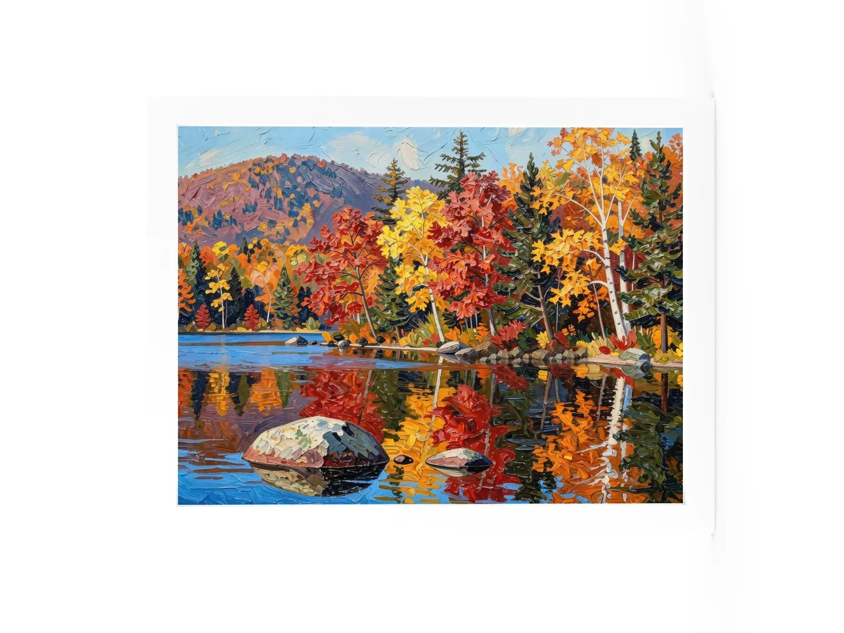 Autumn Shoreline as a 12 by 16 inch framed print in a white frame: red, orange and yellow fall trees and white birches along a calm lake, mirrored in the water, in bold oil-painting brushstrokes.