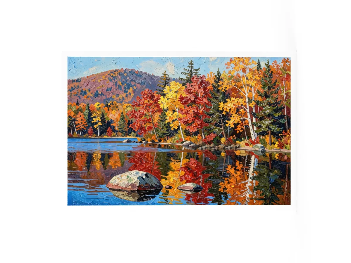Autumn Shoreline as a 24 by 36 inch framed print in a white frame: red, orange and yellow fall trees and white birches along a calm lake, mirrored in the water, in bold oil-painting brushstrokes.