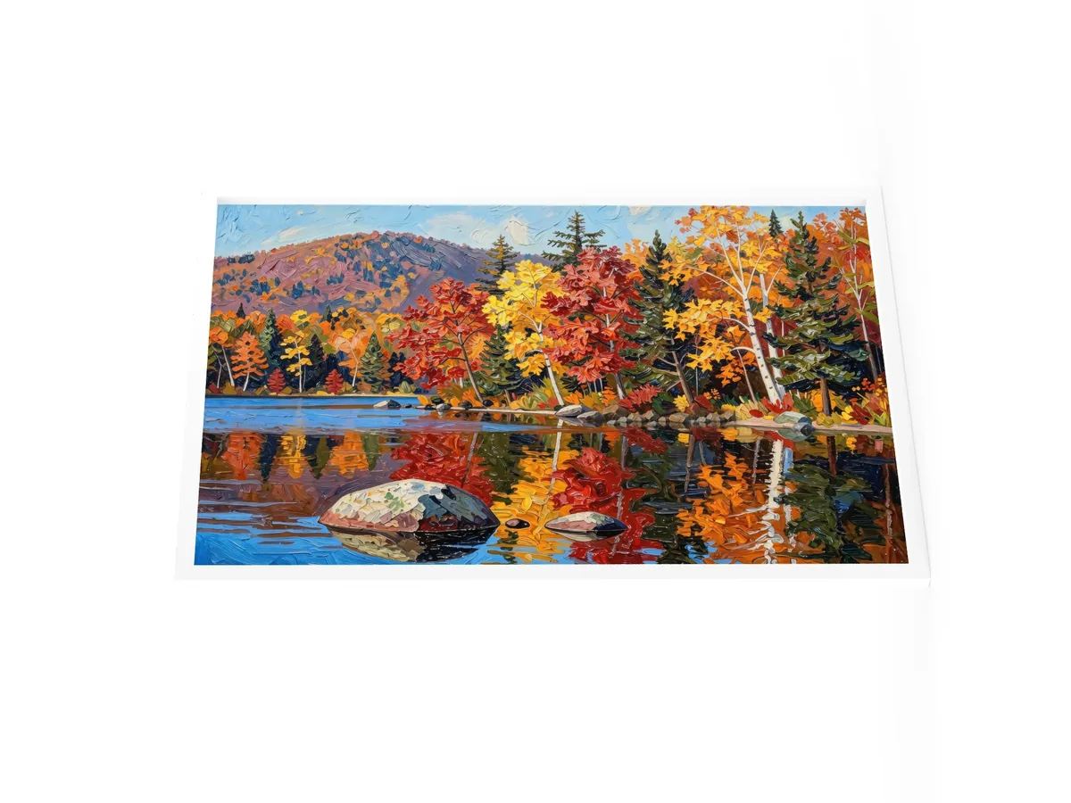 Autumn Shoreline as a 24 by 36 inch framed print in a white frame: red, orange and yellow fall trees and white birches along a calm lake, mirrored in the water, in bold oil-painting brushstrokes.
