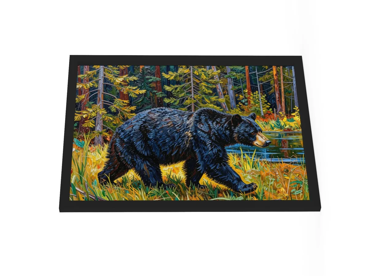 Black Bear at the Edge of the Woods as an 18 by 24 inch framed print in a black frame: a black bear walking out of the spruce at the edge of a lake through tall grass in evening sun, in bold oil-painting brushstrokes.