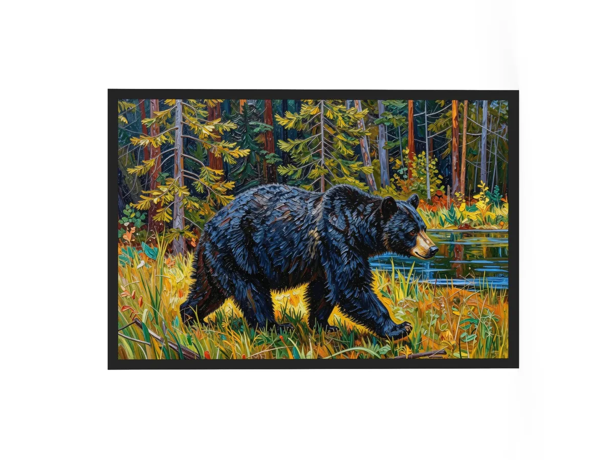 Black Bear at the Edge of the Woods as a 24 by 36 inch framed print in a black frame: a black bear walking out of the spruce at the edge of a lake through tall grass in evening sun, in bold oil-painting brushstrokes.