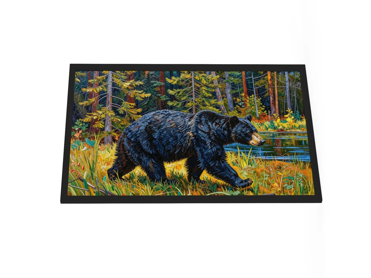 Black Bear at the Edge of the Woods as a 24 by 36 inch framed print in a black frame: a black bear walking out of the spruce at the edge of a lake through tall grass in evening sun, in bold oil-painting brushstrokes.