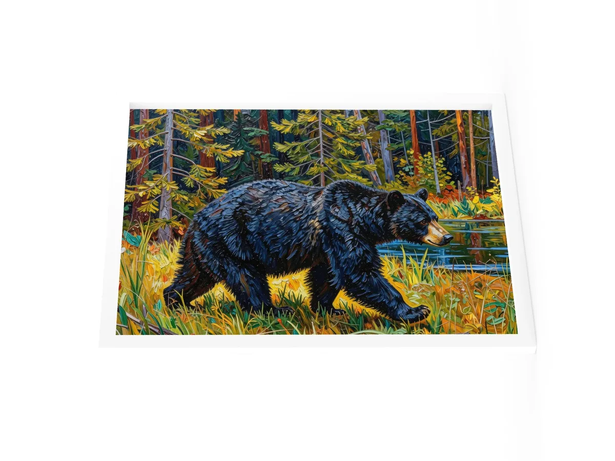 Black Bear at the Edge of the Woods as an 18 by 24 inch framed print in a white frame: a black bear walking out of the spruce at the edge of a lake through tall grass in evening sun, in bold oil-painting brushstrokes.