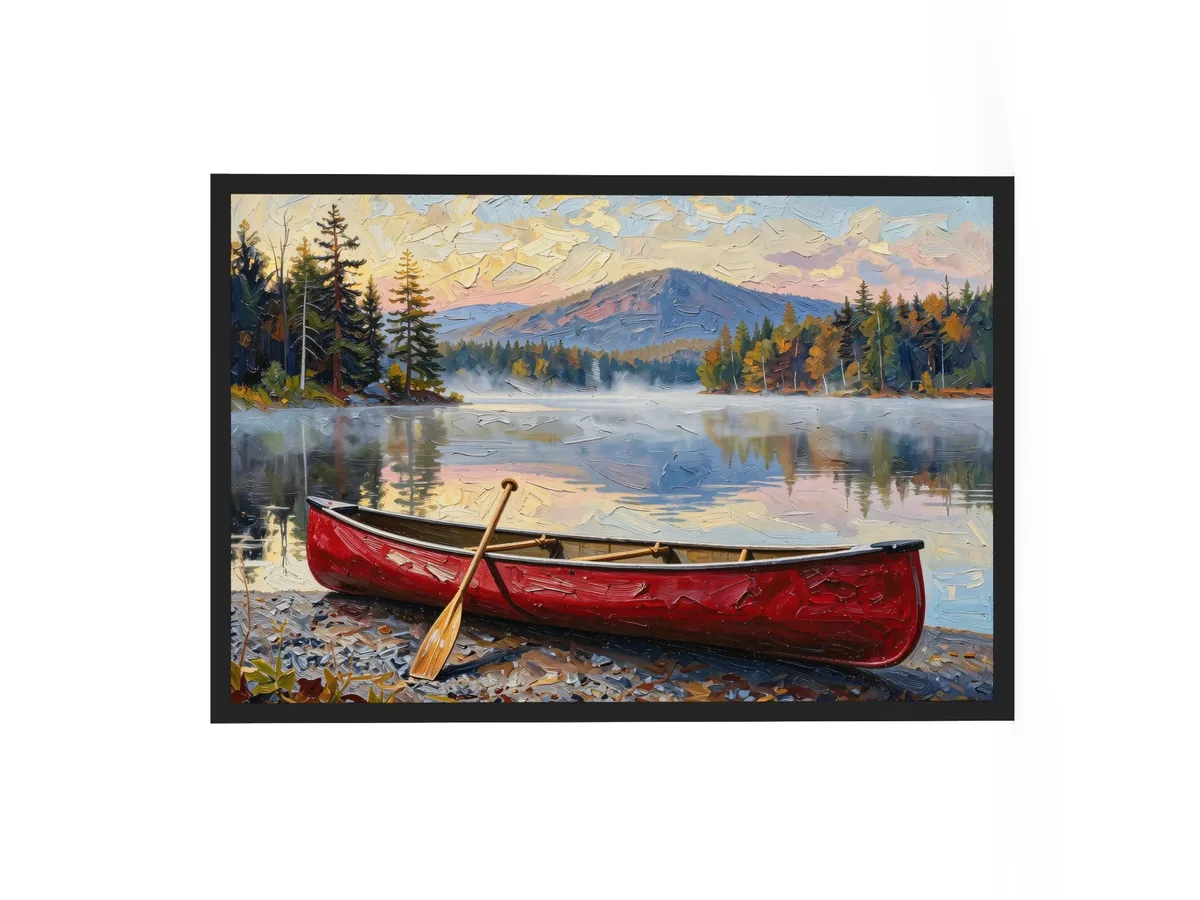 Canoe in Morning Mist as a 24 by 36 inch framed print in a black frame: a red wooden canoe with a paddle leaning on it, on a lakeshore as morning mist lifts off a calm Adirondack lake below a mountain, in bold oil-painting brushstrokes.