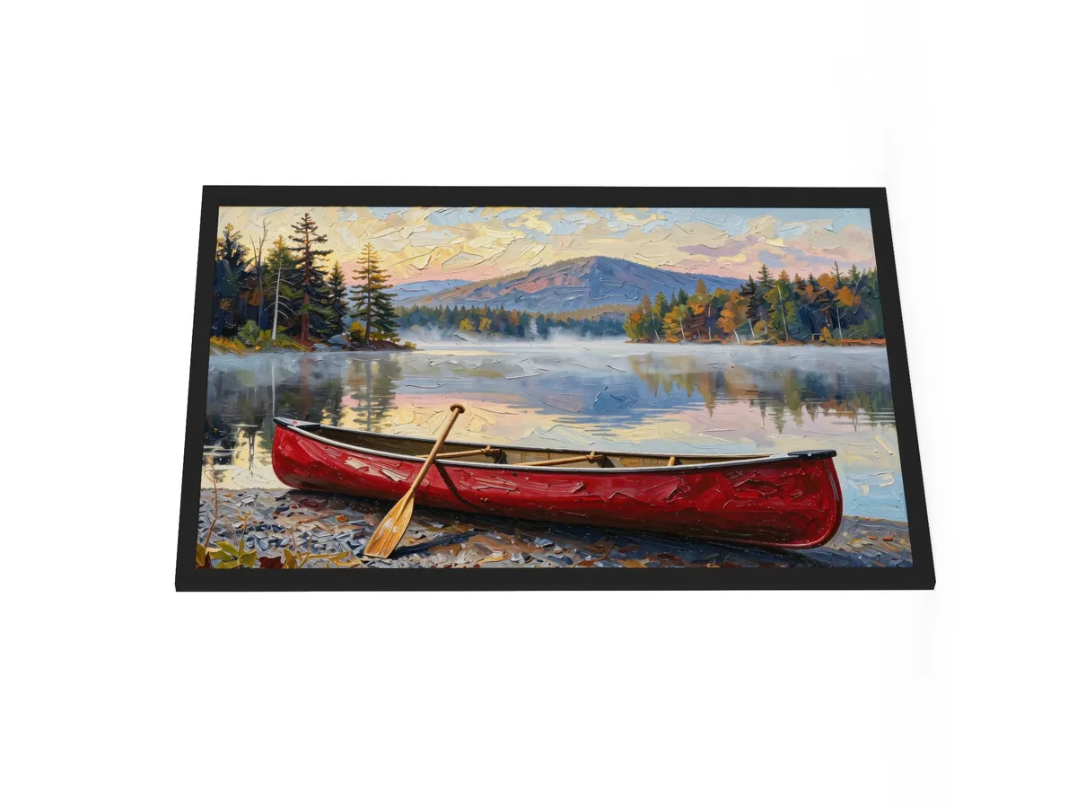 Canoe in Morning Mist as a 24 by 36 inch framed print in a black frame: a red wooden canoe with a paddle leaning on it, on a lakeshore as morning mist lifts off a calm Adirondack lake below a mountain, in bold oil-painting brushstrokes.
