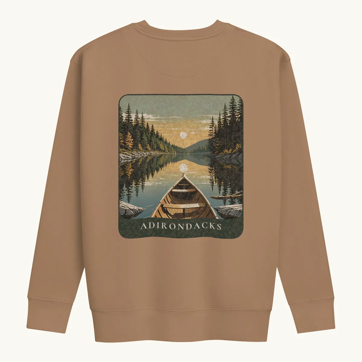 Canoe Sunset Crewneck in Latte, back: the bow of a wooden canoe on an Adirondack lake at sunset, Adirondacks.