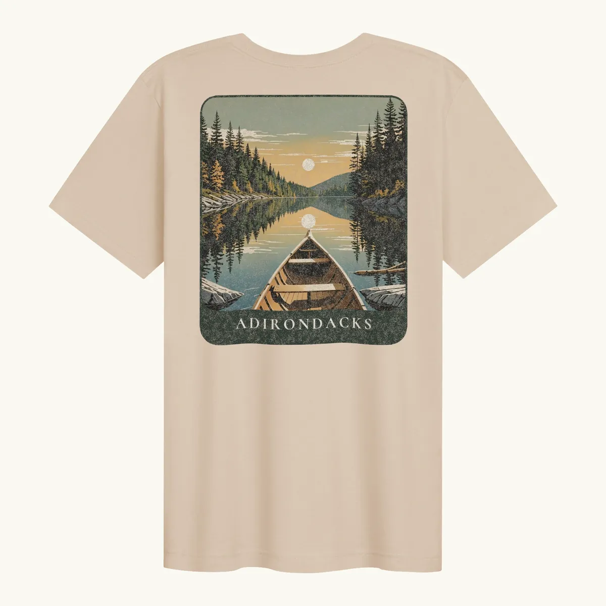 Canoe Sunset Tee in Soft Cream, back: the bow of a wooden canoe on an Adirondack lake at sunset, Adirondacks.