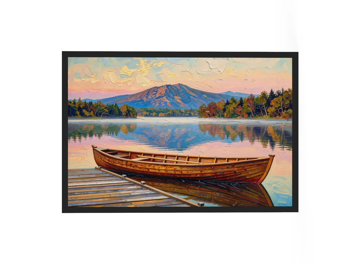 Guideboat at Dawn as a 24 by 36 inch framed print in a black frame: a varnished wooden Adirondack guideboat tied alongside a dock at dawn, with mist on a still lake and a mountain in pink light, in bold oil-painting brushstrokes.