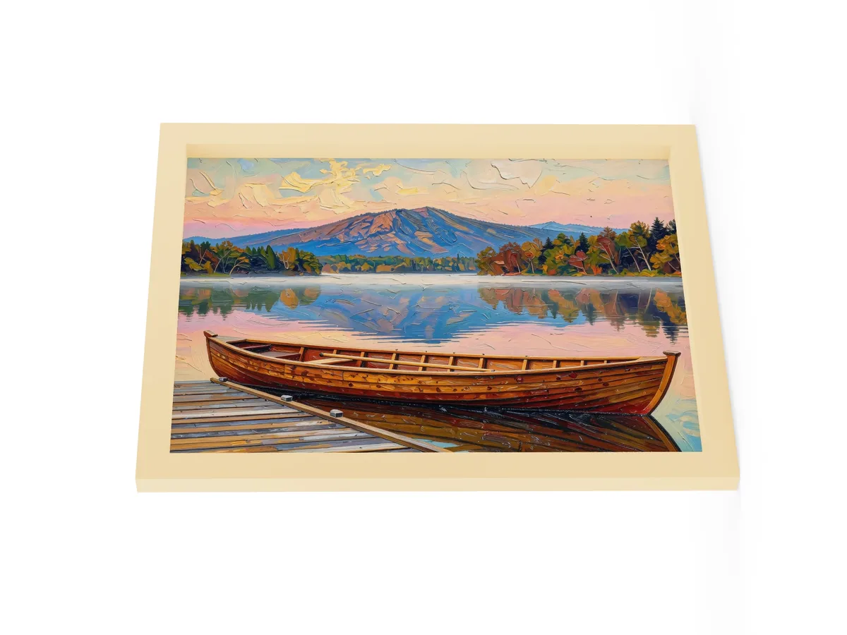 Guideboat at Dawn as a 12 by 16 inch framed print in a natural wood frame: a varnished wooden Adirondack guideboat tied alongside a dock at dawn, with mist on a still lake and a mountain in pink light, in bold oil-painting brushstrokes.