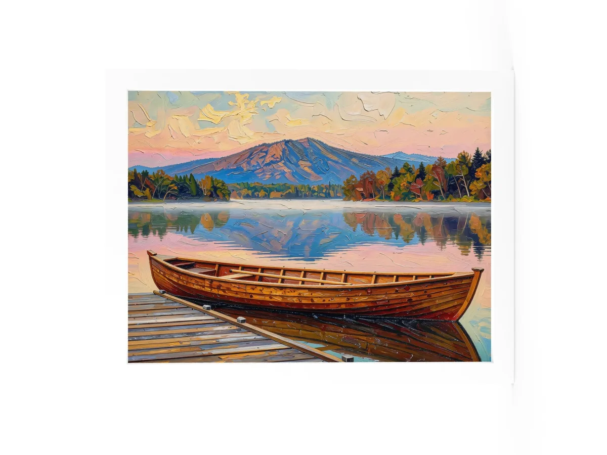 Guideboat at Dawn as a 12 by 16 inch framed print in a white frame: a varnished wooden Adirondack guideboat tied alongside a dock at dawn, with mist on a still lake and a mountain in pink light, in bold oil-painting brushstrokes.