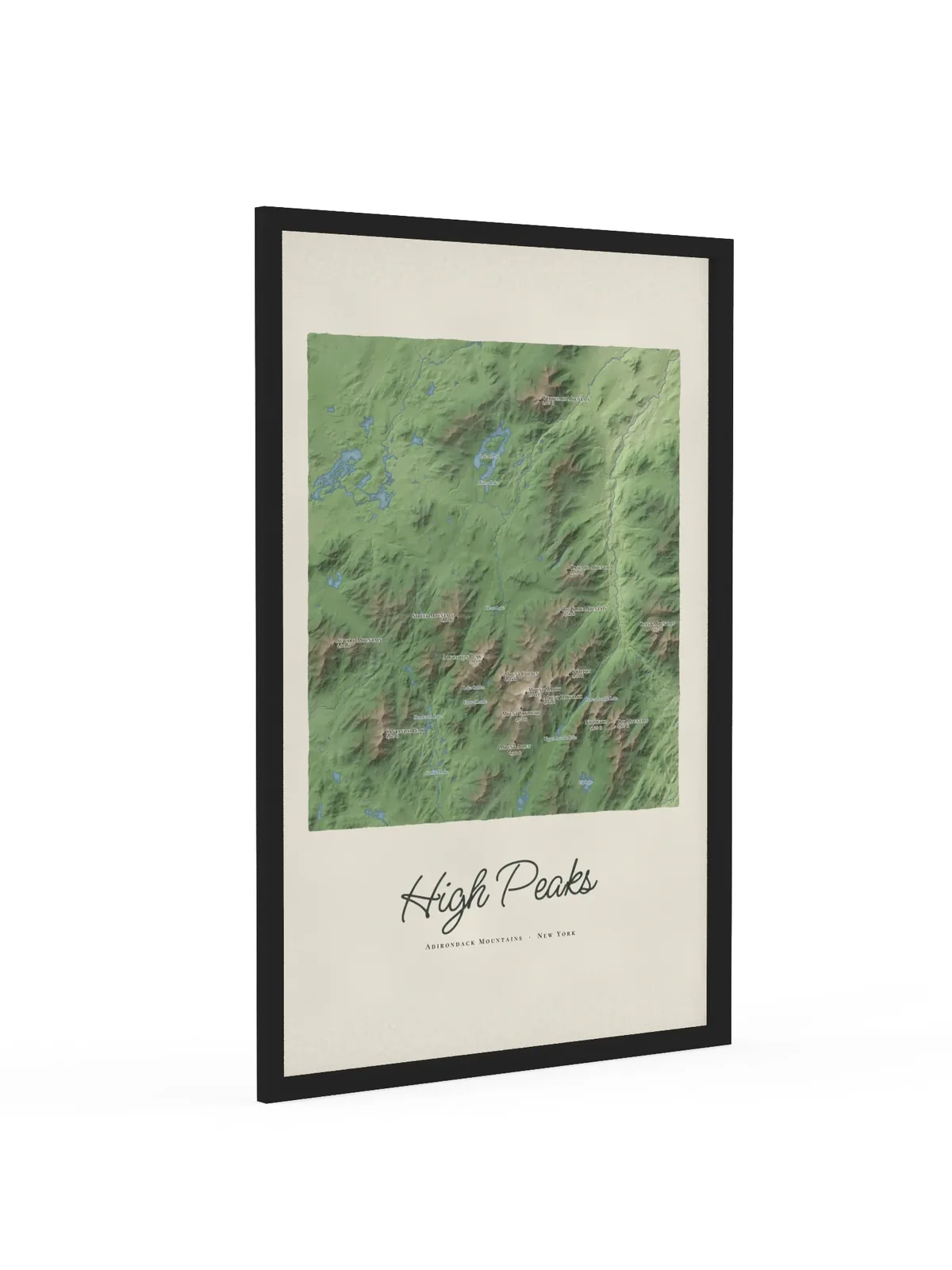 High Peaks Map as a 24 by 36 inch framed print in a black frame: a painted map of the Adirondack High Peaks with the summits shaded and sixteen peaks named with their heights, lakes and rivers in blue, with High Peaks lettered below in dark green script.