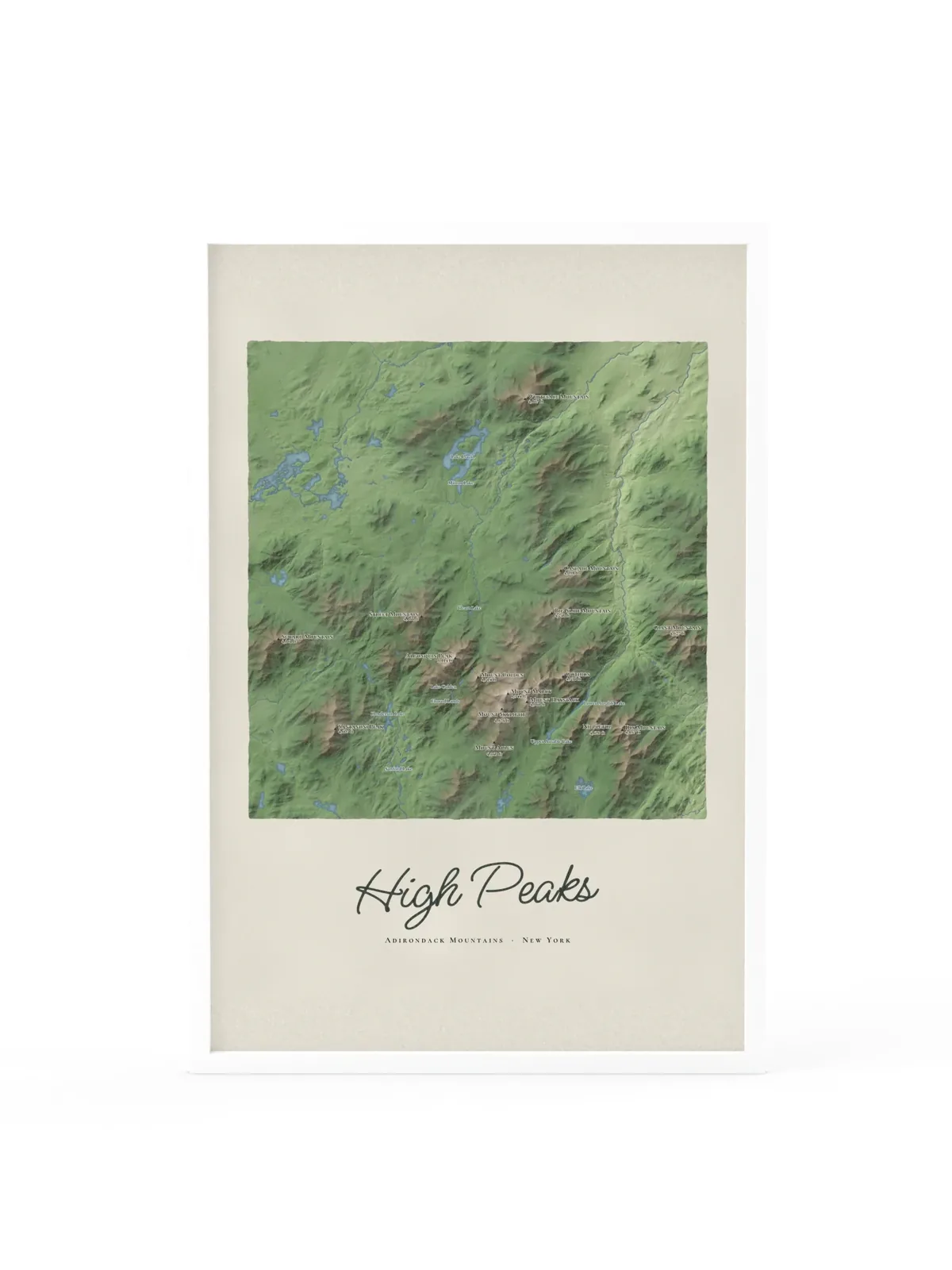 High Peaks Map as a 24 by 36 inch framed print in a white frame: a painted map of the Adirondack High Peaks with the summits shaded and sixteen peaks named with their heights, lakes and rivers in blue, with High Peaks lettered below in dark green script.