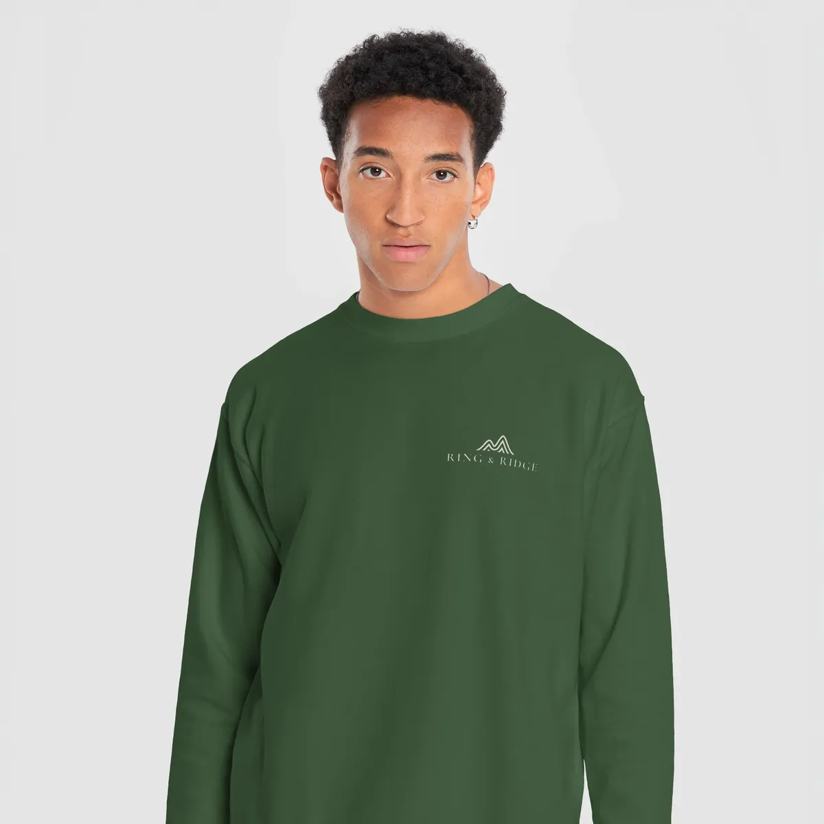 Lakeside Campfire Crewneck in Forest Green, front: two Adirondack chairs by a lakeside campfire at dusk, Adirondacks, Est. 1892.