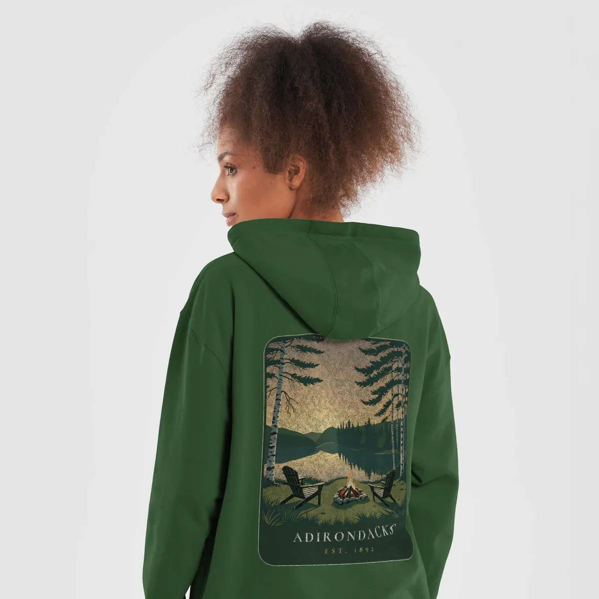 Lakeside Campfire Hoodie in Forest Green, back: two Adirondack chairs by a lakeside campfire at dusk, Adirondacks, Est. 1892.