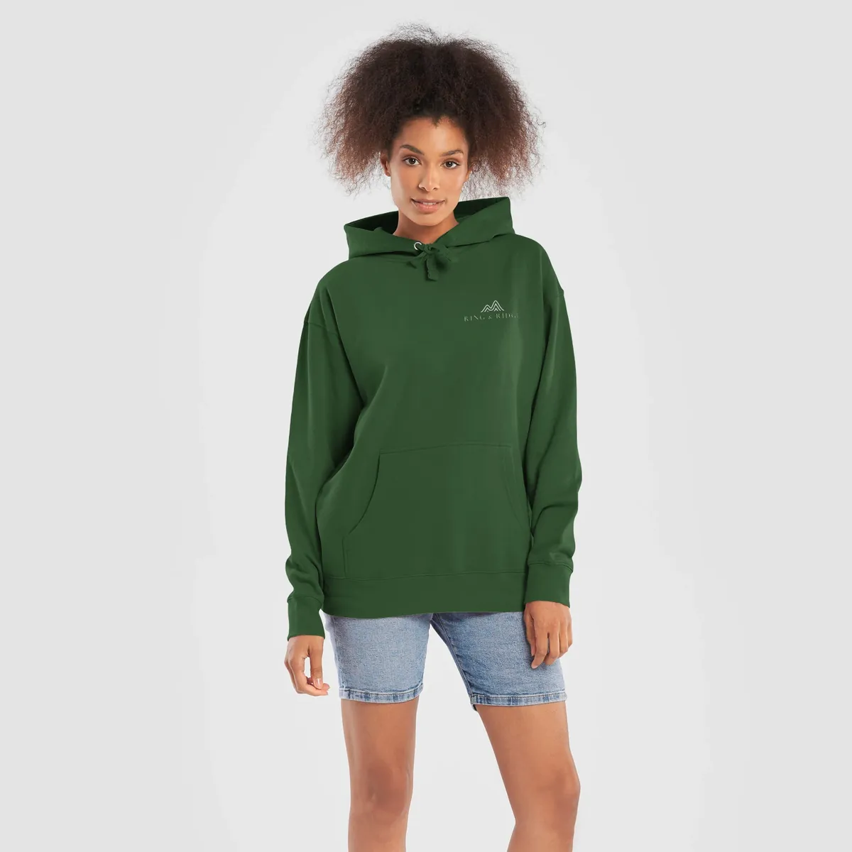 Lakeside Campfire Hoodie in Forest Green, front: two Adirondack chairs by a lakeside campfire at dusk, Adirondacks, Est. 1892.