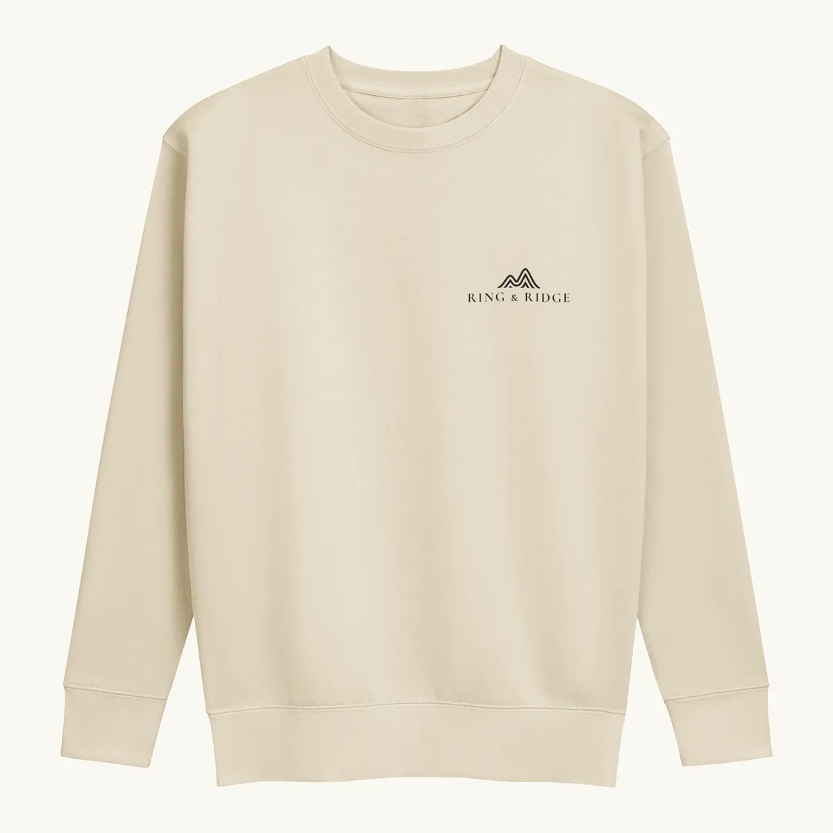 Loon at Night Crewneck in Bone, front: a loon on a moonlit Adirondack lake in a round badge, Adirondack Park, Est. 1892.