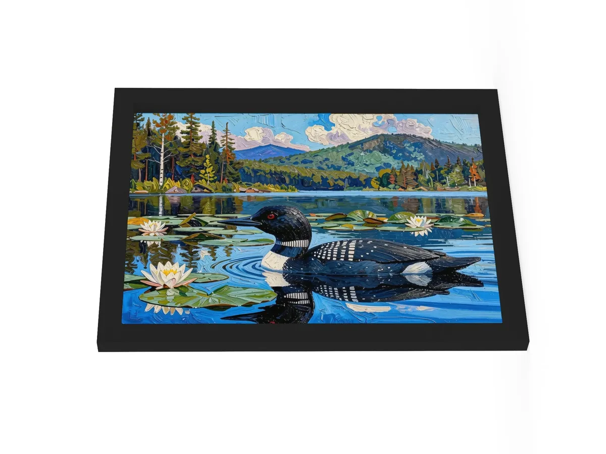 Loon in the Lily Pads as a 12 by 16 inch framed print in a black frame: a common loon swimming among lily pads and white water lilies on a blue Adirondack lake, in bold oil-painting brushstrokes.