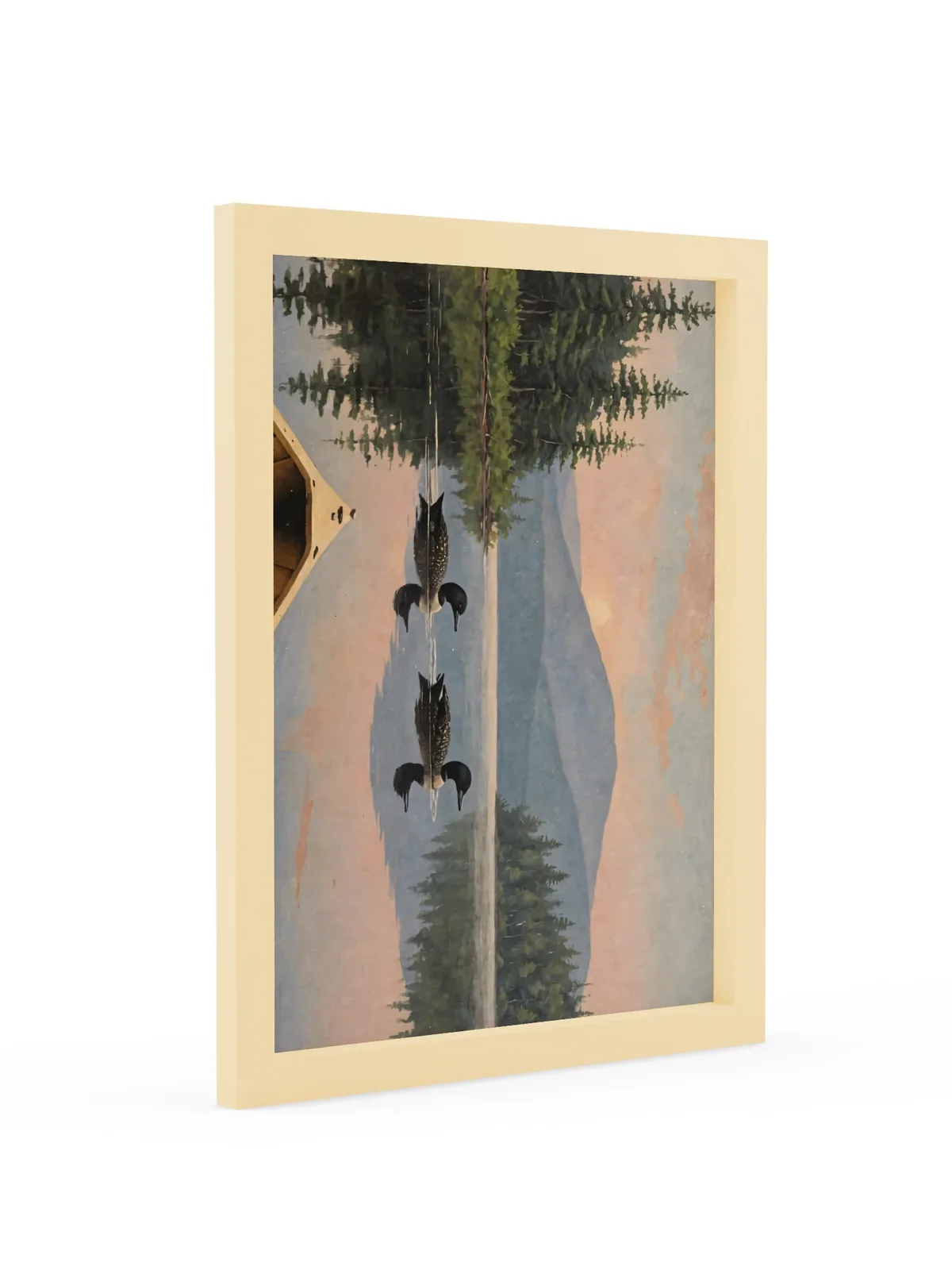 Loon Pair at Sunrise as a 12 by 16 inch framed print in a natural wood frame: two common loons swimming side by side across a still Adirondack lake at sunrise, seen from the bow of a wooden canoe, with spruce shores, a blue mountain and a peach-pink sky doubled in the water, in soft, traditional oil brushwork.