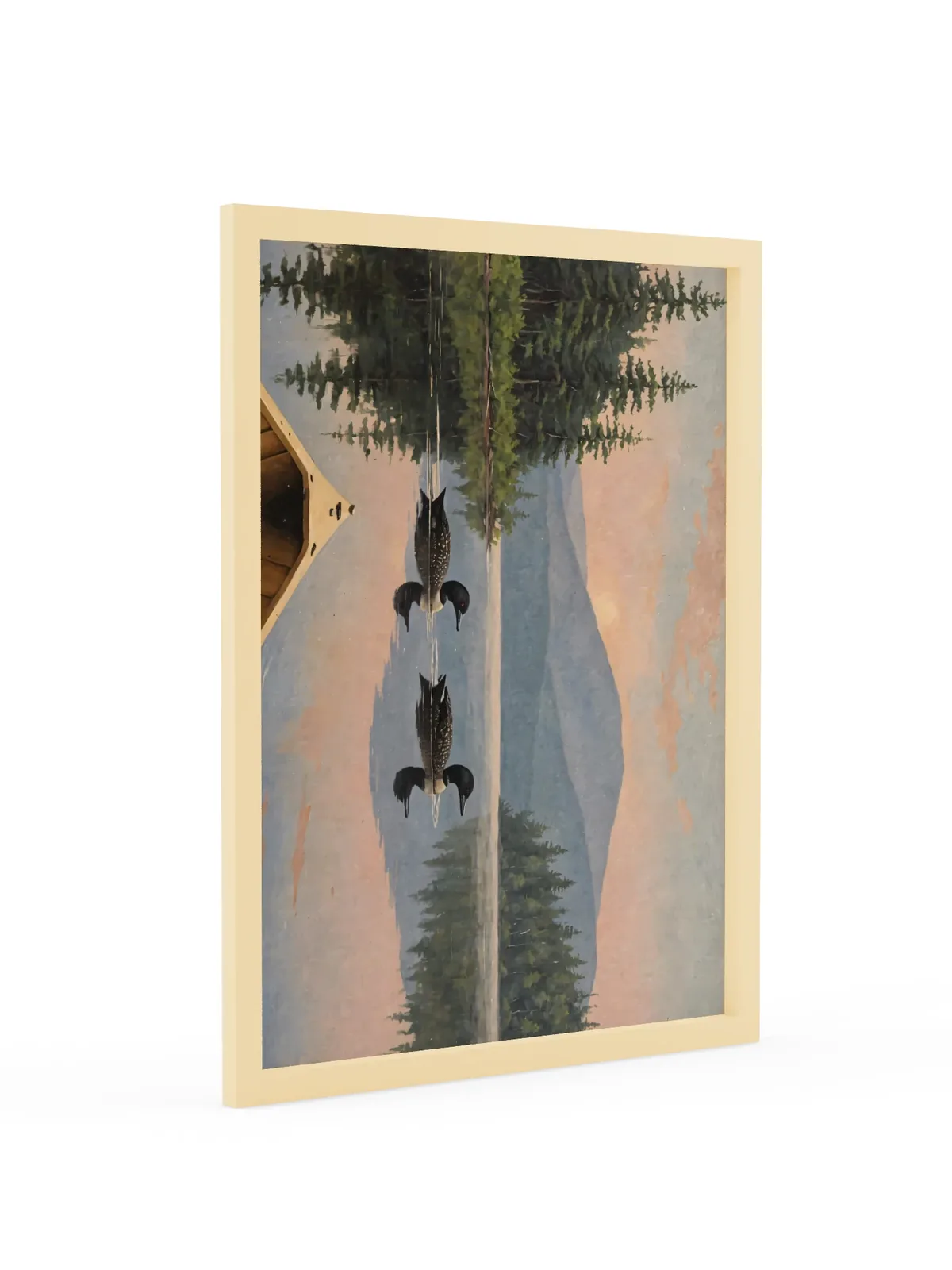 Loon Pair at Sunrise as an 18 by 24 inch framed print in a natural wood frame: two common loons swimming side by side across a still Adirondack lake at sunrise, seen from the bow of a wooden canoe, with spruce shores, a blue mountain and a peach-pink sky doubled in the water, in soft, traditional oil brushwork.