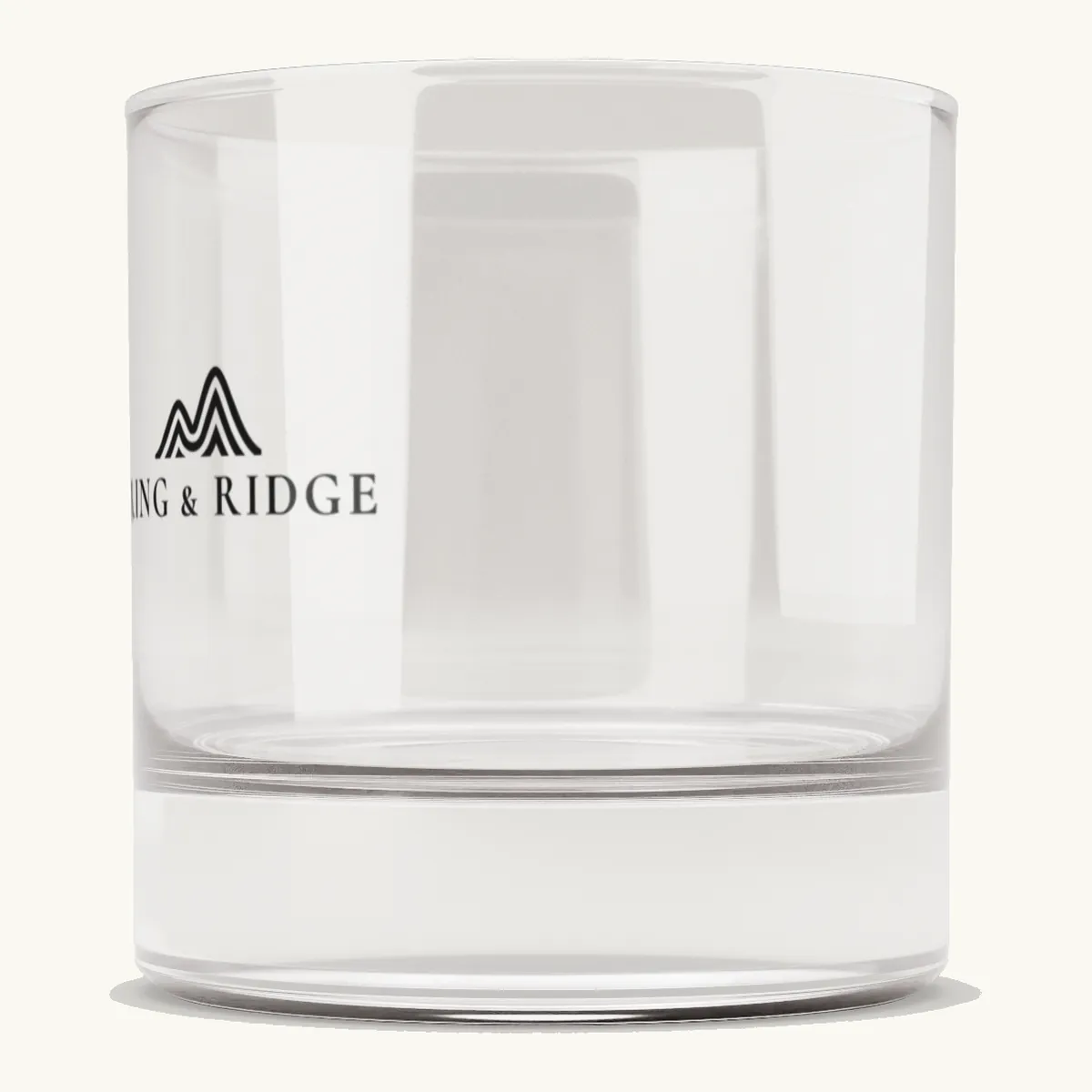 Ring & Ridge Rocks Glass: the Ring & Ridge mountain logo.