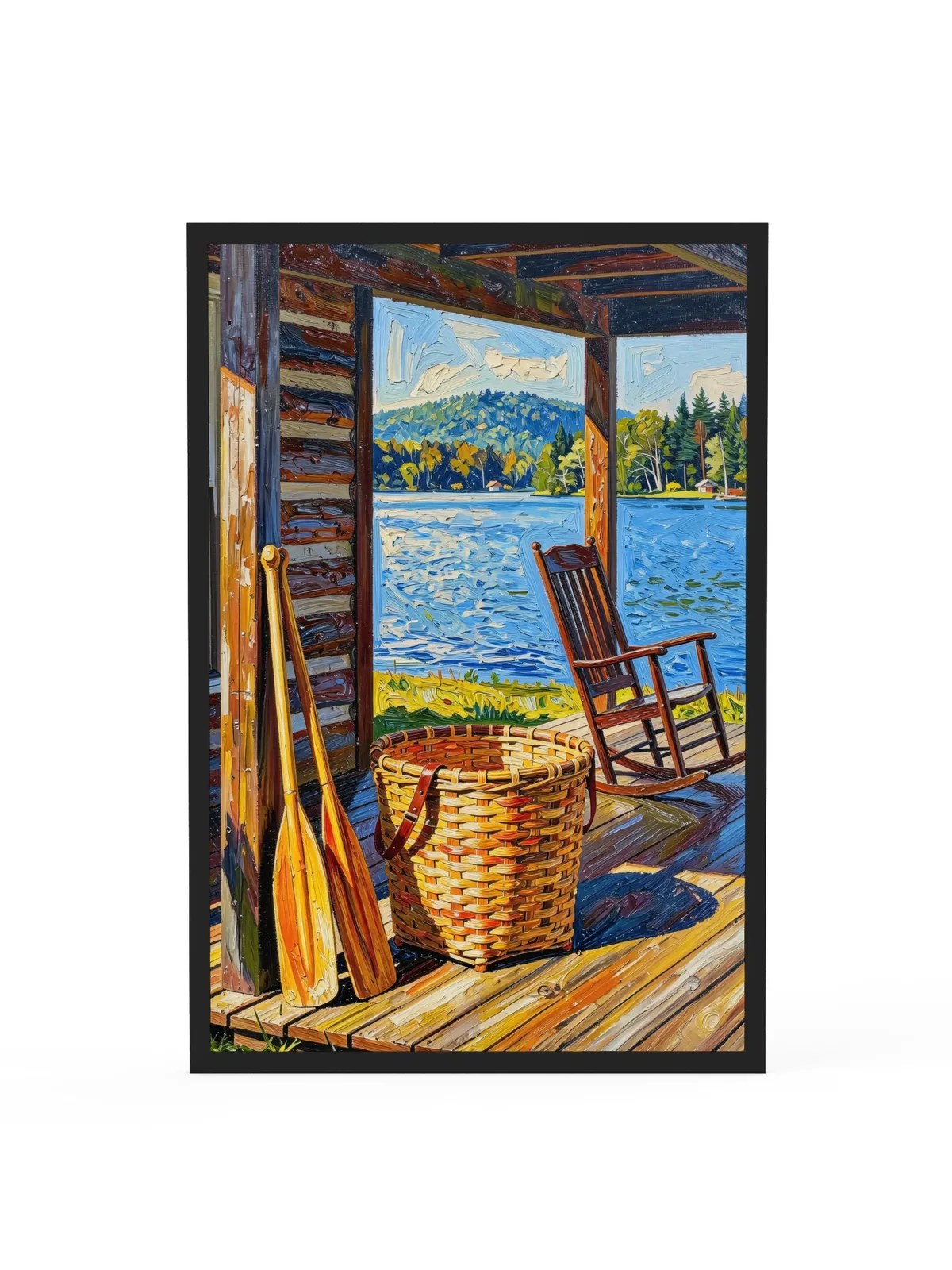 The Camp Porch as a 24 by 36 inch framed print in a black frame: a camp porch with a woven pack basket, two canoe paddles against the log wall and an empty rocking chair facing the lake, in bold oil-painting brushstrokes.