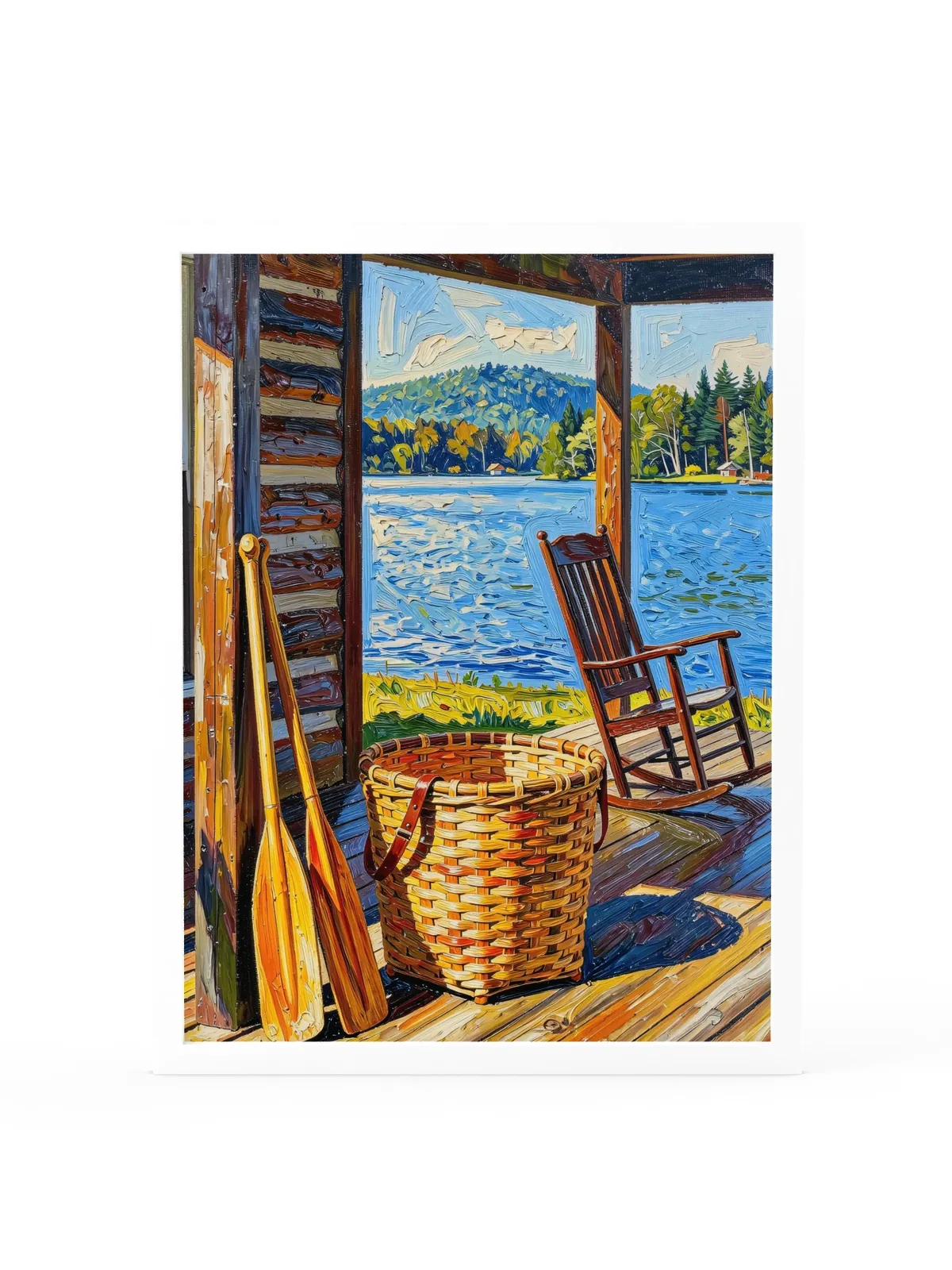 The Camp Porch as an 18 by 24 inch framed print in a white frame: a camp porch with a woven pack basket, two canoe paddles against the log wall and an empty rocking chair facing the lake, in bold oil-painting brushstrokes.