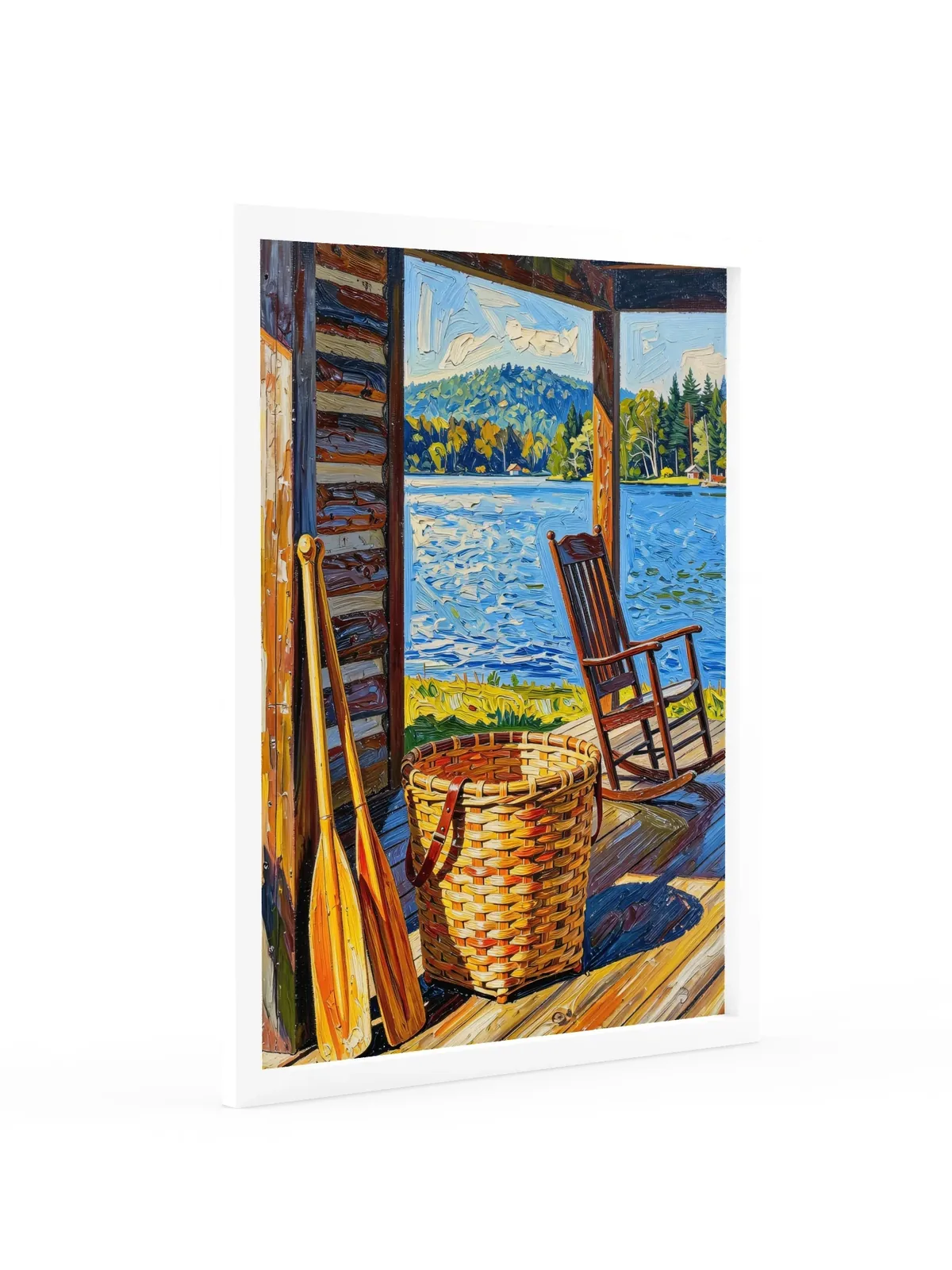 The Camp Porch as an 18 by 24 inch framed print in a white frame: a camp porch with a woven pack basket, two canoe paddles against the log wall and an empty rocking chair facing the lake, in bold oil-painting brushstrokes.