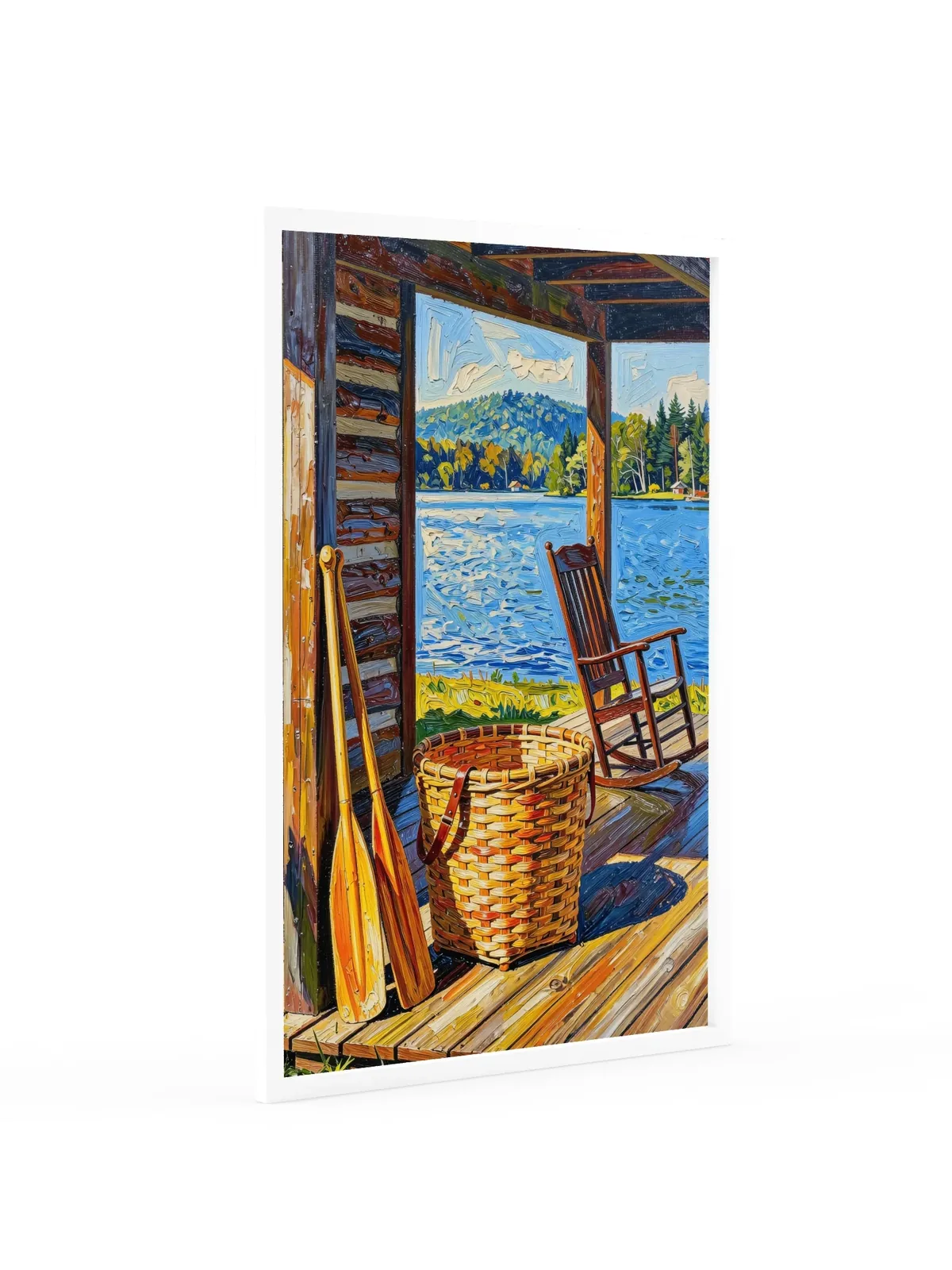 The Camp Porch as a 24 by 36 inch framed print in a white frame: a camp porch with a woven pack basket, two canoe paddles against the log wall and an empty rocking chair facing the lake, in bold oil-painting brushstrokes.