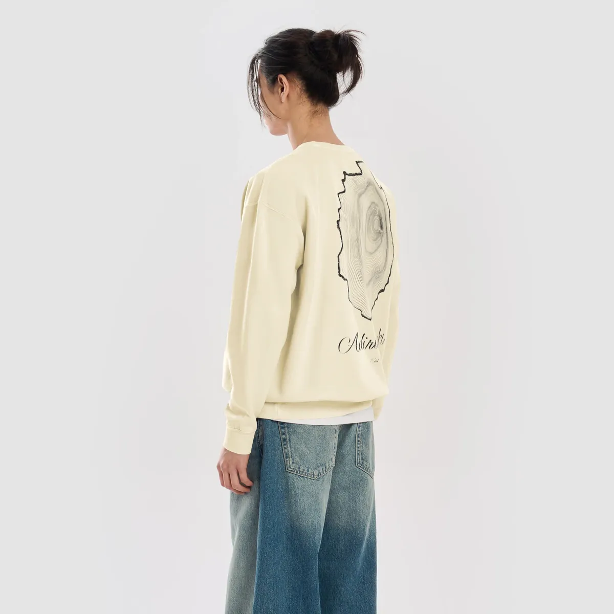Tree Ring Crewneck in Ivory, back: the Ring & Ridge tree rings in the shape of the Adirondack Park.