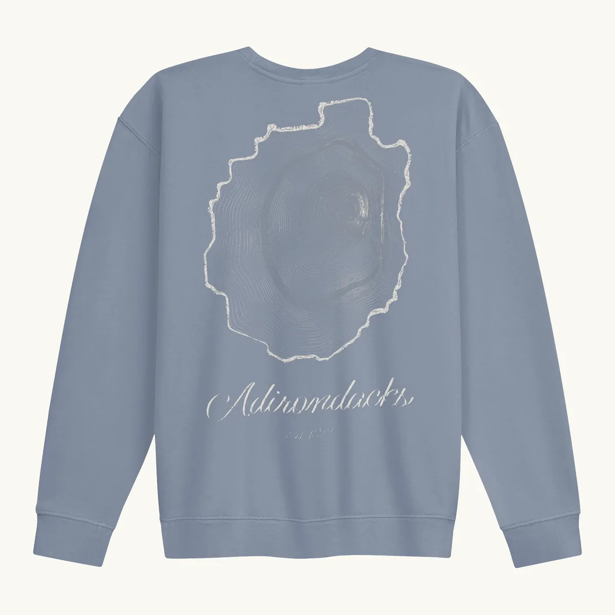 Tree Ring Crewneck in Blue Jean, back: the Ring & Ridge tree rings in the shape of the Adirondack Park.