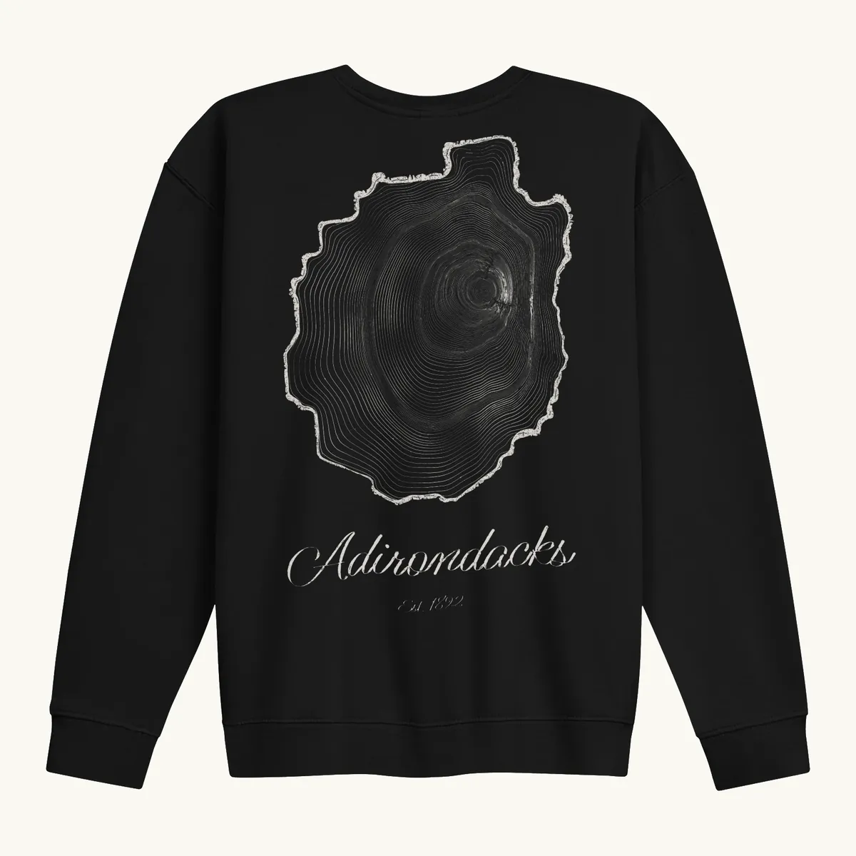 Tree Ring Crewneck in Black, back: the Ring & Ridge tree rings in the shape of the Adirondack Park.