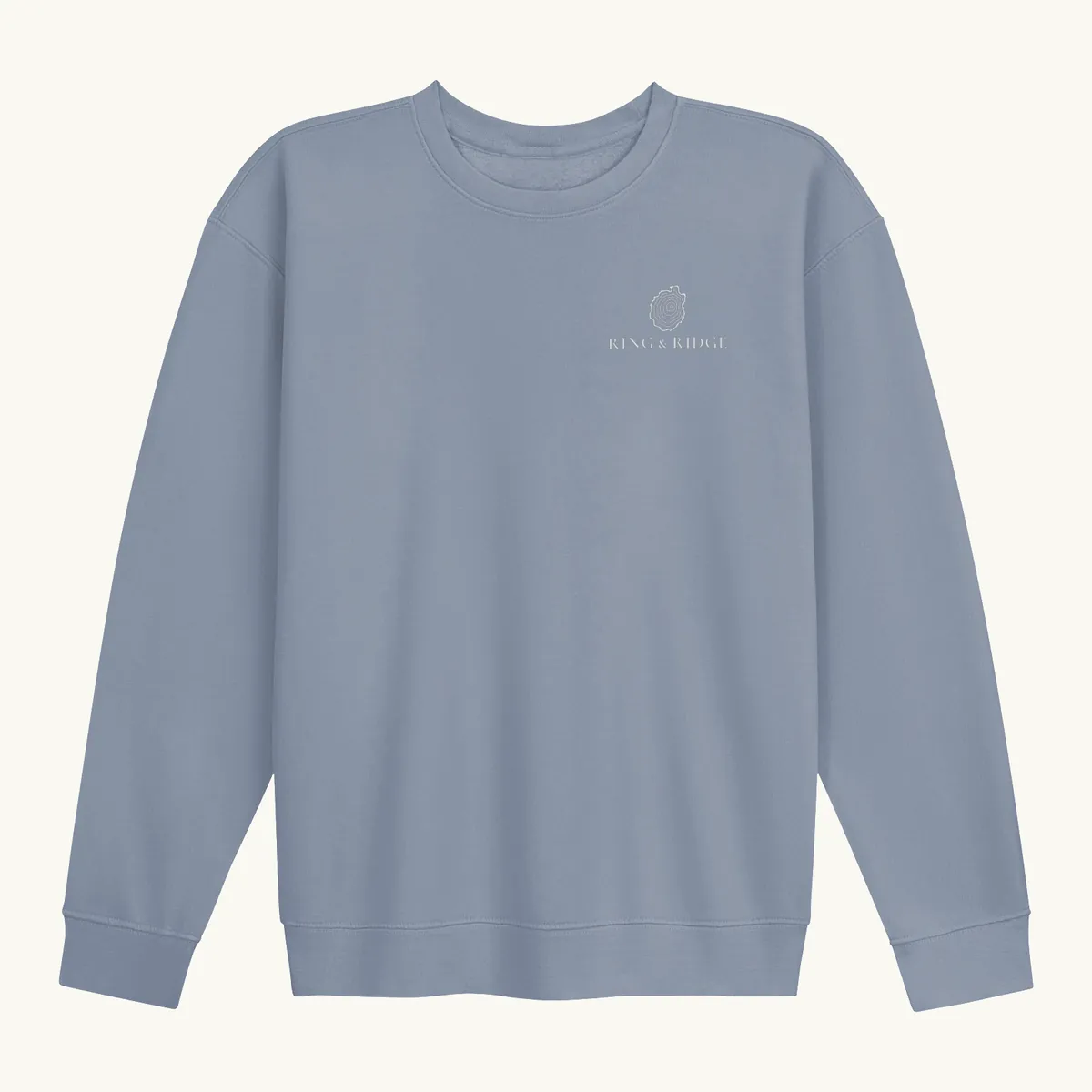 Tree Ring Crewneck in Blue Jean, front: the Ring & Ridge tree rings in the shape of the Adirondack Park.