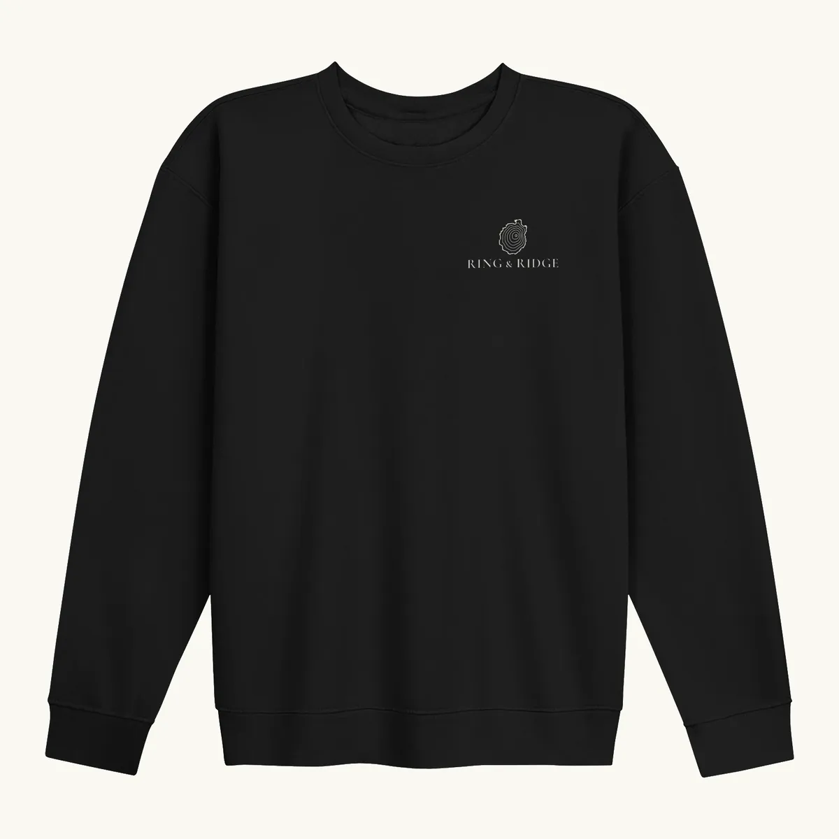 Tree Ring Crewneck in Black, front: the Ring & Ridge tree rings in the shape of the Adirondack Park.