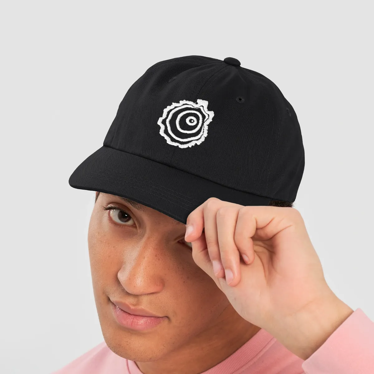 Tree Ring Dad Hat in Black, with the Ring & Ridge tree ring.