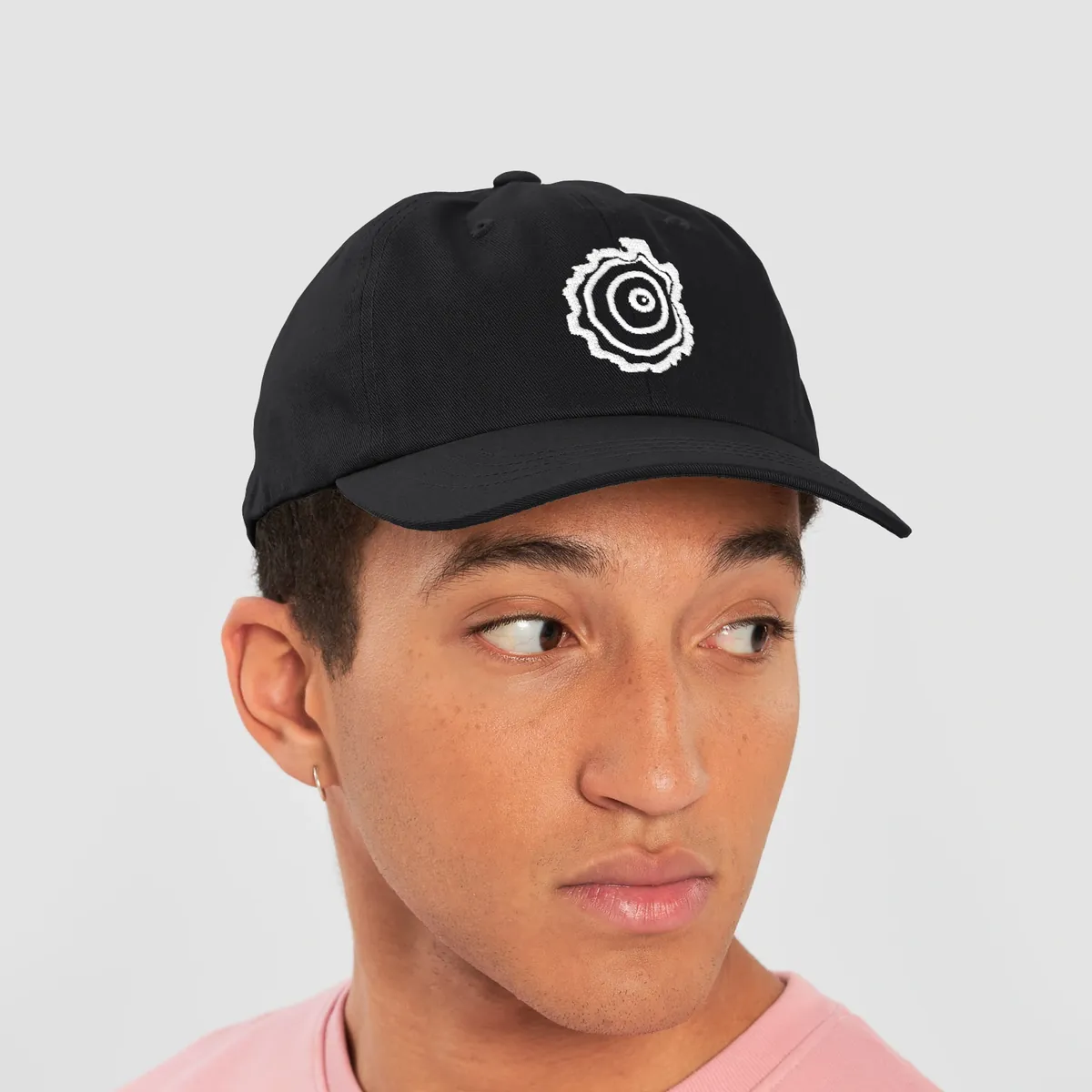 Tree Ring Dad Hat in Black, with the Ring & Ridge tree ring.