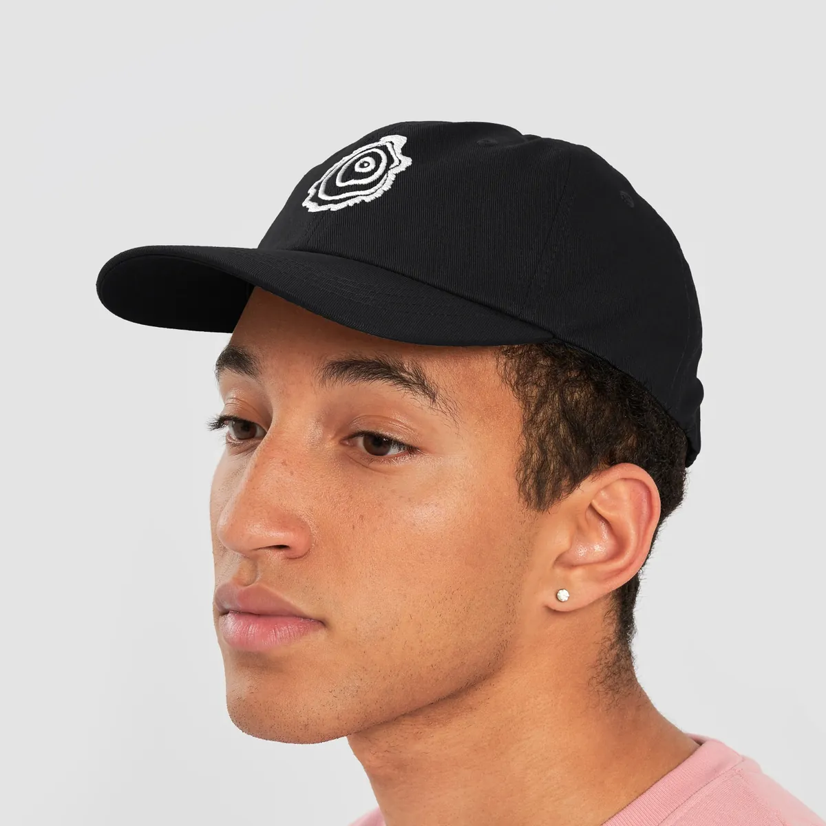 Tree Ring Dad Hat in Black, with the Ring & Ridge tree ring.