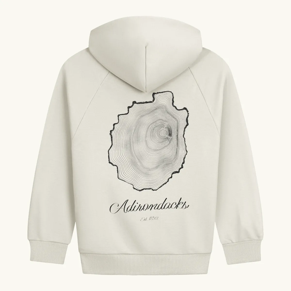 Tree Ring Hoodie in Cream, back: the Ring & Ridge tree rings in the shape of the Adirondack Park.