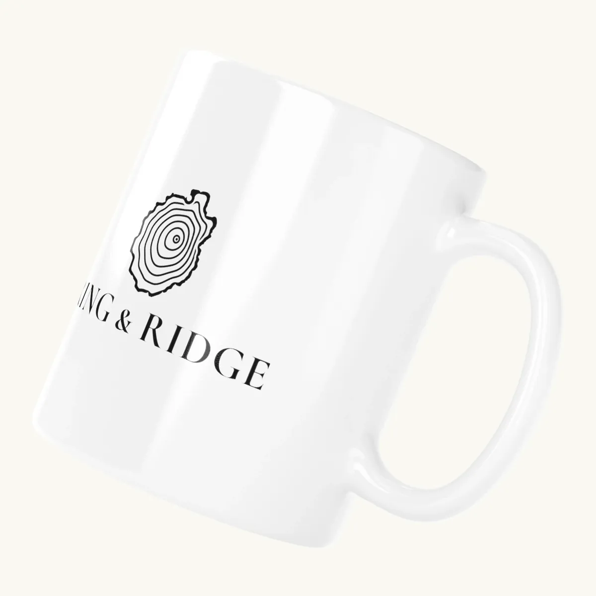 Tree Ring Mug: the Ring & Ridge tree rings in the shape of the Adirondack Park.