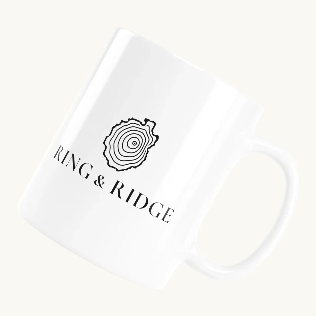 Tree Ring Mug: the Ring & Ridge tree rings in the shape of the Adirondack Park.