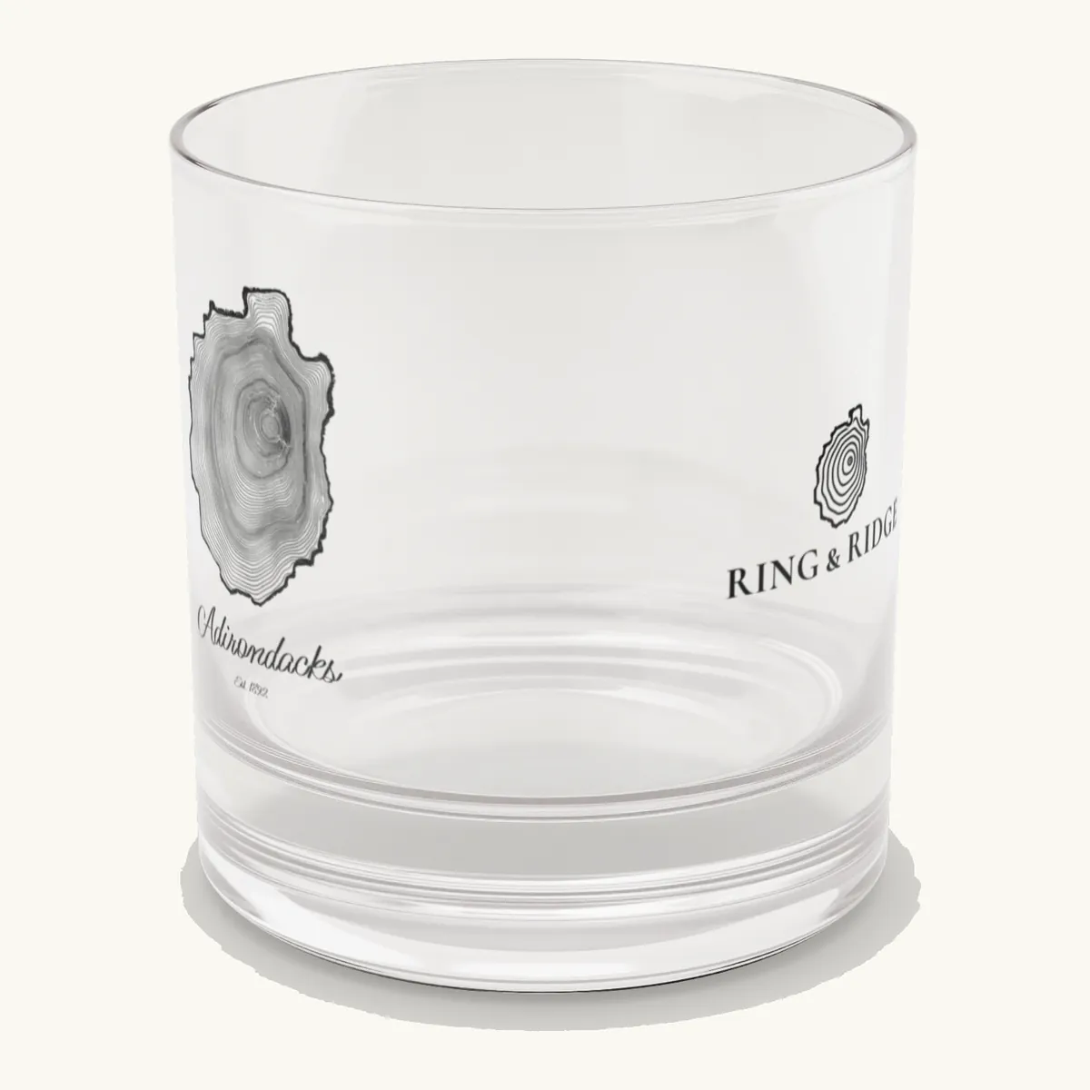 Tree Ring Rocks Glass: the Ring & Ridge tree rings in the shape of the Adirondack Park.
