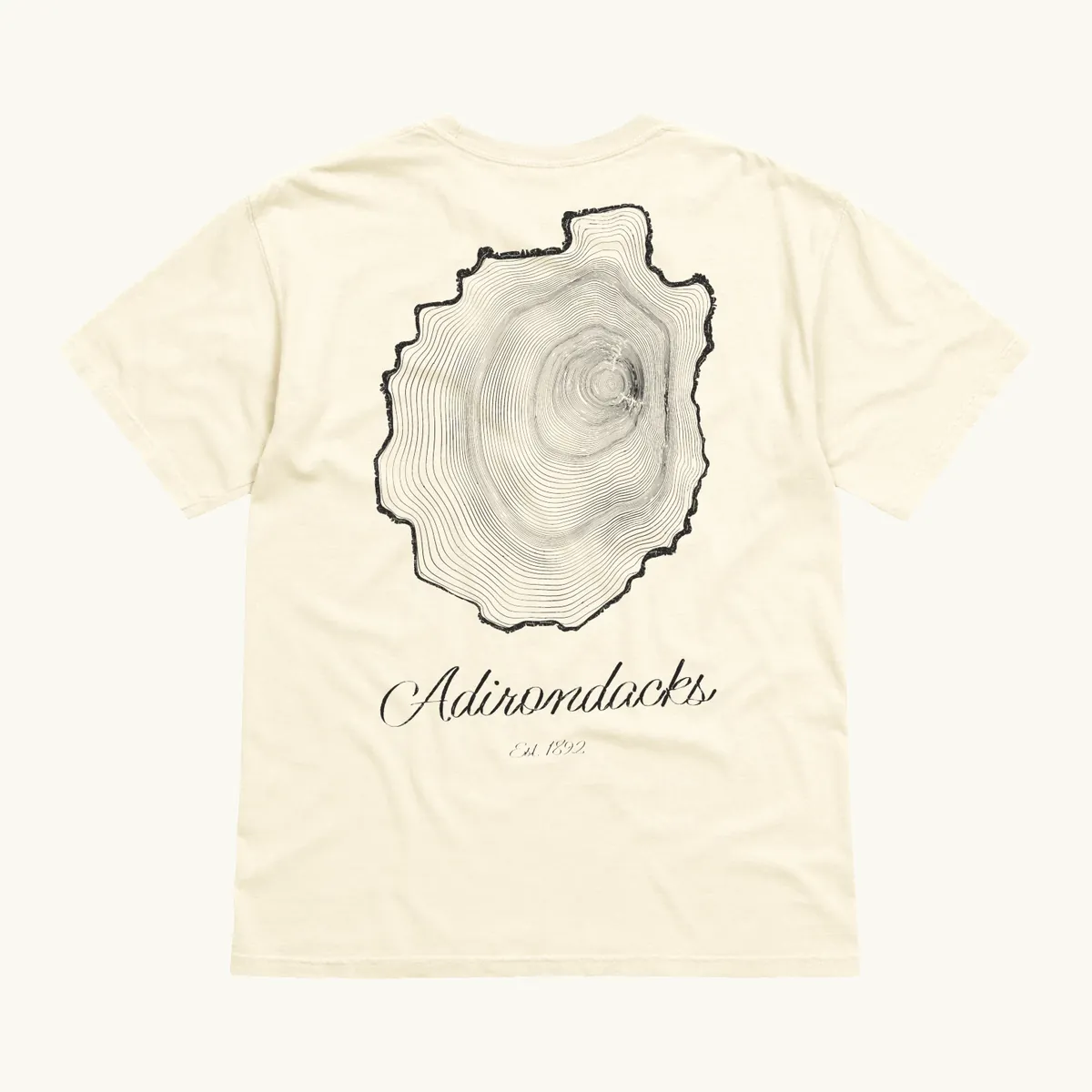 Tree Ring Tee in Ivory, back: the Ring & Ridge tree rings in the shape of the Adirondack Park.