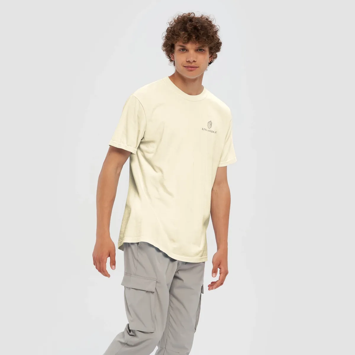 Tree Ring Tee in Ivory, front: the Ring & Ridge tree rings in the shape of the Adirondack Park.