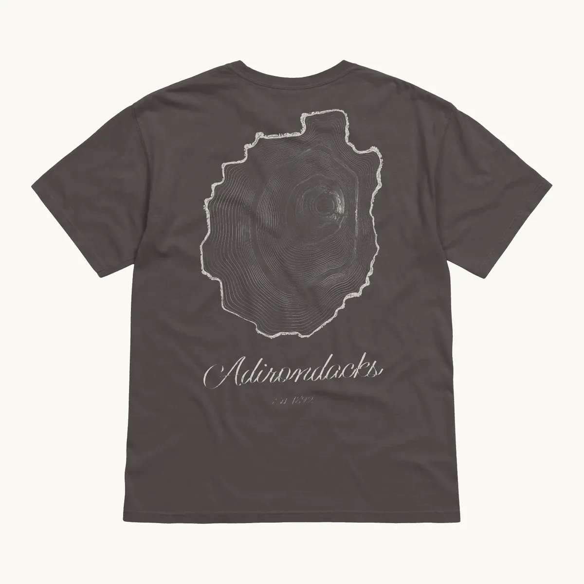 Tree Ring Tee in Pepper, back: the Ring & Ridge tree rings in the shape of the Adirondack Park.