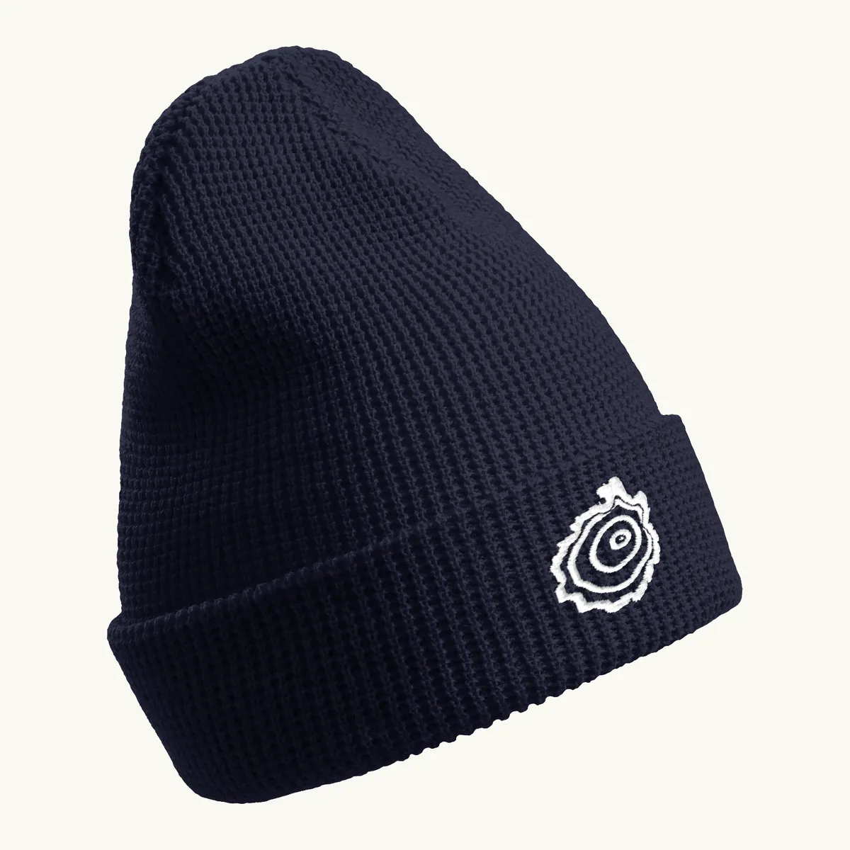 Tree Ring Waffle Beanie in Navy, with the Ring & Ridge tree ring.