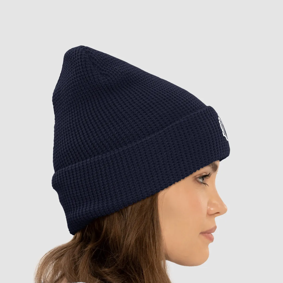 Tree Ring Waffle Beanie in Navy, with the Ring & Ridge tree ring.