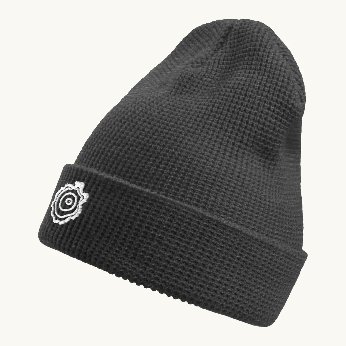 Tree Ring Waffle Beanie in Heather Charcoal, with the Ring & Ridge tree ring.